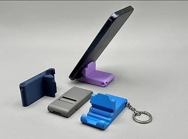 Telefon üçün tripodlar: 📱🔑 Kompakt Telefon Tutacağı + Açarliq Kiçik ölçü, böyük rahatlıq! Bu — 8