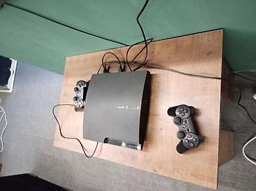 sony video: PlayStation 3 Slim oyun konsolu - Model: PS3 Slim (üst qapağı — 1