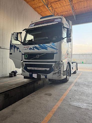 тандем волво: Тягач, Volvo, 2011 г., Бортовой — 1