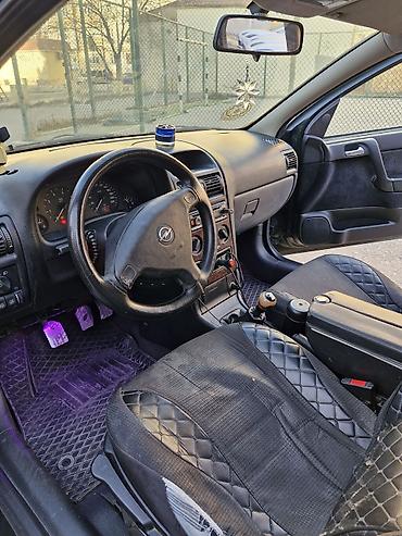 Opel: Model: Opel Astra G sedan Kuzov: 4 qapı, tünd yaşıl rəng Mühərrik və — 4