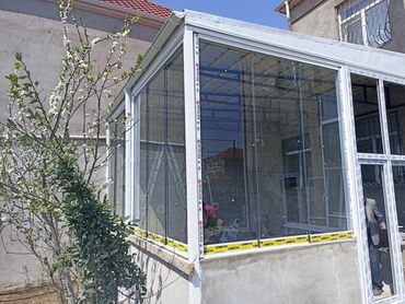 Tikinti və təmir: Cam balkonlar 
 kitab və sürgülü .
öz həyətimdə yığıram vatsap aktivdi