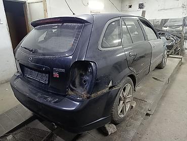 mazda 2000: Mazda 323: 2004 г., 2 л, Автомат, Бензин, Хэтчбэк — 4