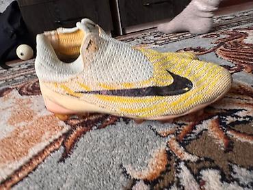 конный шлем: Футбольные бутсы Nike Phantom GX (без шнурков, с носком-манжетой) — 1