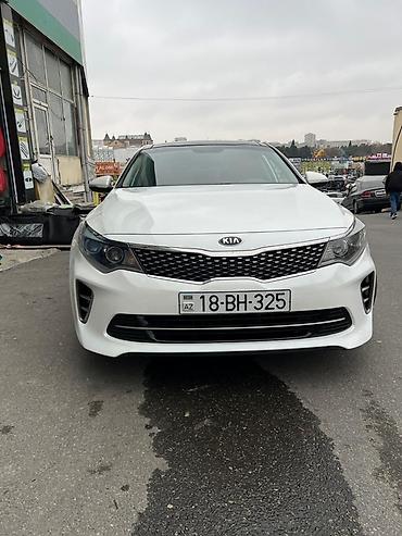 k5 kia: Kia K5 sedan – ağ rəng, benzinli, avtomat ötürücü. Xarici: - Arxa — 5