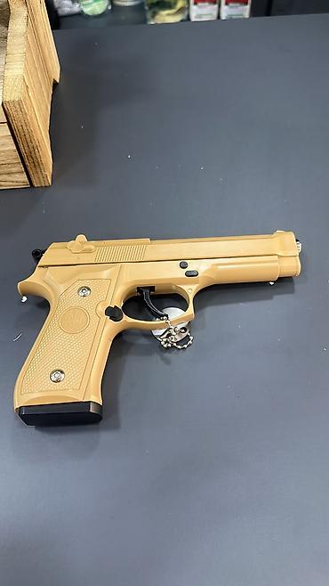 kicik qara don: Məhsul: Airsoft tapança (6 mm BB) Təsvir: - Qutu üzərində “GLOCK” — 2