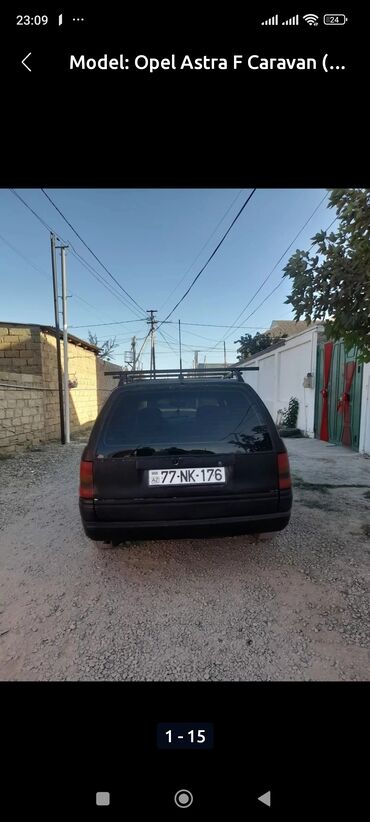Opel: Opel Astra Caravan – universal kuzovlu, qara rəngdə. Əsas — 5