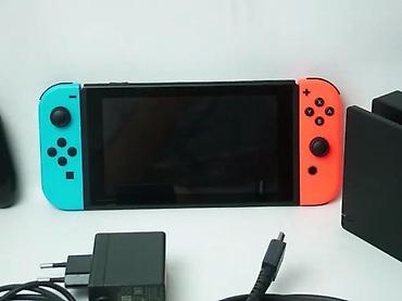 Nintendo Switch: Nintendo Switch V2 konzola u korektnom stanju, sa manjim tragovima — 4