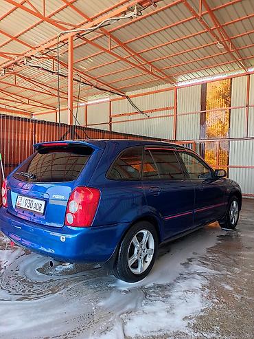 мазда фамили: Mazda Familia: 2002 г., 1.6 л, Механика, Бензин, Универсал — 3