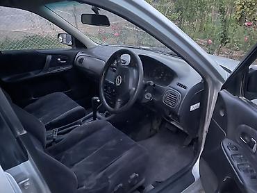 мото зонтик: Mazda Familia: 1999 г., 1.5 л, Автомат, Бензин, Универсал — 3