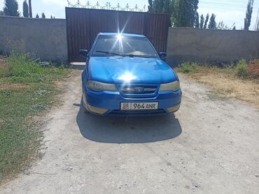 мотор ниссан микра: Синий седан Daewoo Nexia, подходящий для повседневного использования