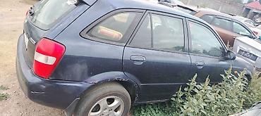 кажы сай: Mazda 323: 2001 г., 1.6 л, Кол менен иштөөчү, Бензин, Универсал — 8