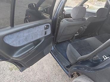 12 t: Mazda 626: 1997 г., 1.8 л, Механика, Бензин, Седан — 6