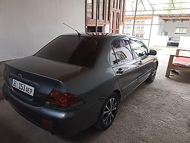фары на опель вектра б: Mitsubishi Lancer: 2006 г., Механика, Седан — 1
