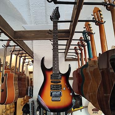 Gitaralar: Elektro-gitara Smiger S-G5 Simlərin sayı: 6 Üst: Cökə ağacı Qol — 2