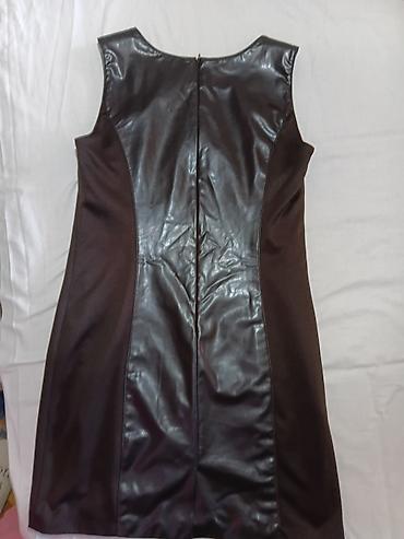 Haljine: Ženska haljina Claudio Ginetti - Model: bez rukava, okrugli izrez — 2