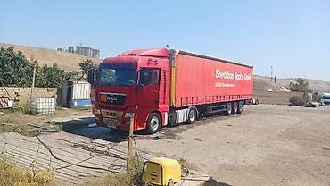 byd taksi arenda: MAN TGX dartqı (çekici) və tentli yarımqoşqu Xüsusiyyətlər: - — 1