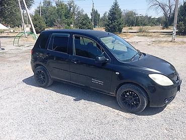 коврик: Mazda Demio: 2005 г., Автомат, Бензин, Хэтчбэк — 7