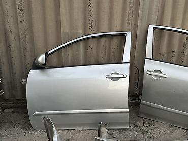 Защита радиатора: Разбор Toyota Corolla (E140/E150), седан, серебристый цвет. В наличии — 25