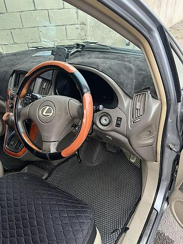 tracker gps: Салон Lexus в светлом бежевом оформлении с установленными черными — 2