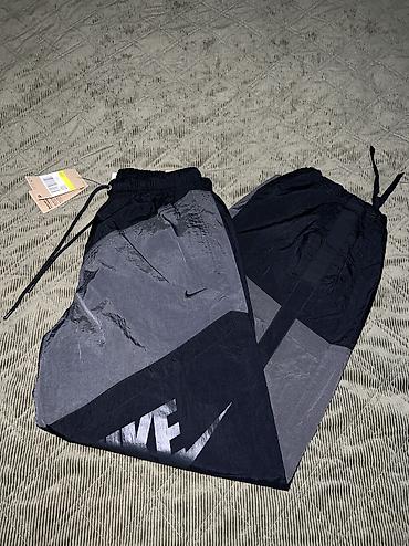 nine west papuče: NIKE Women's Sportswear Mid-Rise Street Woven Open-Hem Pants vel.S — 7