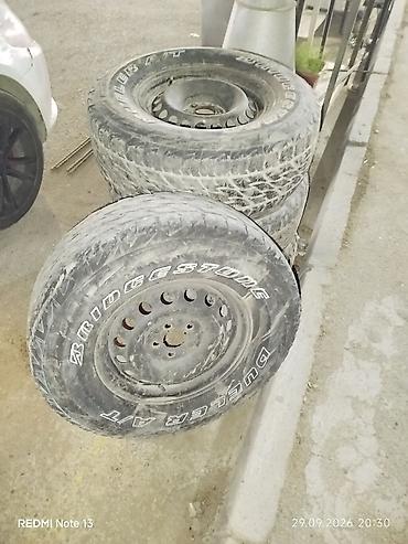 Bridgestone Dueler A/T təkər dəsti + dəmir disklər - Brend/model