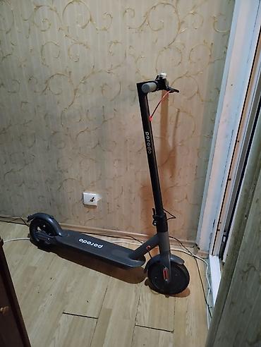 saat samdan: Porodo elektrik skuter Razilaşa bilerik - Brend: Porodo - Rəqəmsal — 5