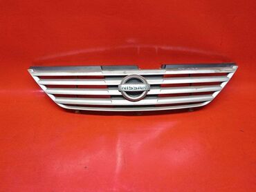 Другие детали КПП и трансмиссии: Решетка радиатора Nissan 1999 г., Б/у, Оригинал