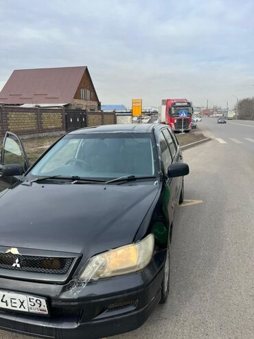 машина жалалабат: Mitsubishi Lancer Cedia Touring, универсал, правый руль. Черный цвет