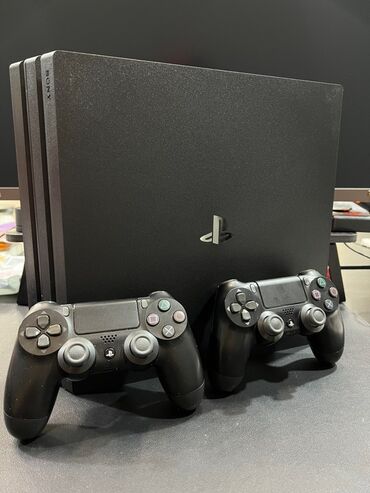 Xbox Series S: PlayStation 4 Pro oyun konsolu + 2 ədəd DualShock 4 idarəetmə pultu -