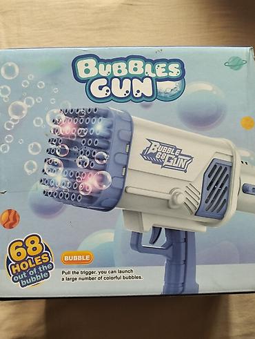 oyuncak tapanca: Məhsul: Bubbles Gun – 68 deşikli baloncuk tapançası Xüsusiyyətlər: - — 1