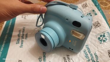 Fotokameralar: Fujifilm Instax Mini 11 ani instafoto kamerası. Bu model avtomatik
