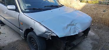 китайский номер: Mazda 626: 1999 г., Бензин, Седан — 3