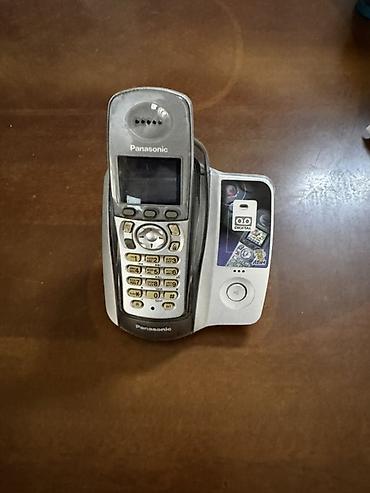 кнопкалы телефонлар: Panasonic KX-TG2050MLS simsiz ev/ofis telefonu və baza stansiyası - — 1