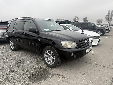 Другие автомобили: Внедорожник/кроссовер черного цвета. Кузов 5‑дверный, на крыше — 3