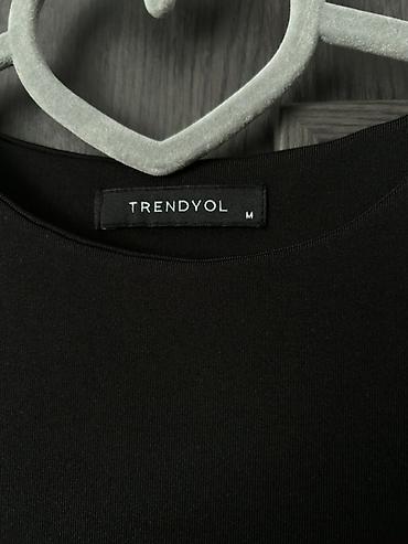 Bodi: Məhsul: Trendyol qadın bodisi Qiymət: 15 AZN (şəkildə göstərilib) - — 3