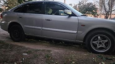 w211 e55 amg kompressor: Mazda 626: 2000 г., Механика, Седан — 3