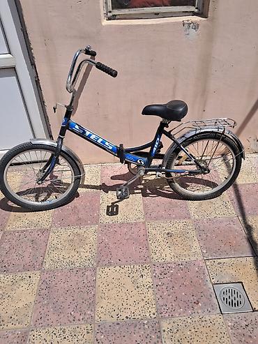 Velosipedlər: Uşaq velosipedi – STELS 410 Xüsusiyyətlər: - Ölçü: 20" təkərlər - — 3