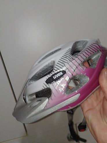 Oprema za bicikliste: Uvex biciklistička kaciga vel obim 52-57 - Brend/model: Uvex (logo na — 3