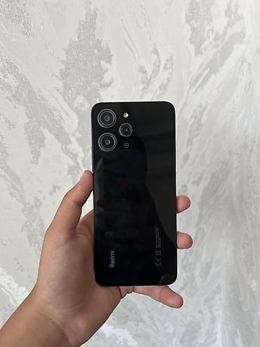 11 telefon: Redmi 12, 128 GB, rəng - Qara, Sensor — 3