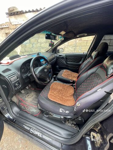 Opel: Opel Astra G sedan – qara rəng Texniki və dizayn: - ECOTEC benzin — 2