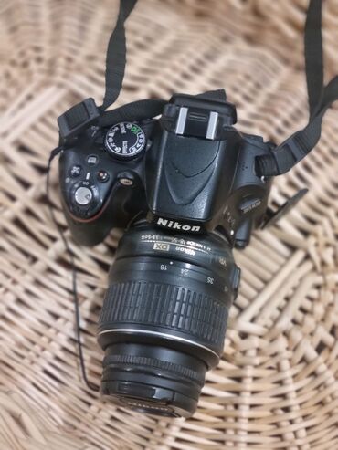 Фотоаппараты: Nikon D5100, комплектный объектив Отличное состояние, линза защищена