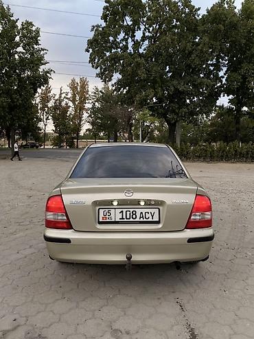Mazda: Mazda 323: 1998 г., 1.5 л, Механика, Бензин, Седан — 16