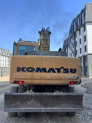 экскаватор гусиничный: Экскаватор, Komatsu, 2000 г., Колесный — 4