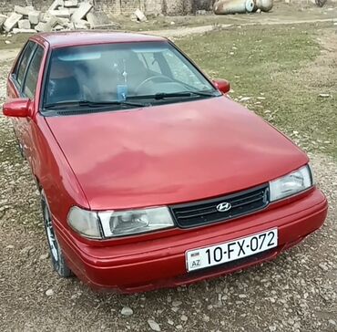 əsgər çəkməsi: Hyundai Excel: 1.5 l | 1994 il