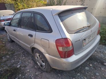 российский машины: Mazda 323: 2002 г., 1.3 л, Механика, Бензин, Вэн/Минивэн