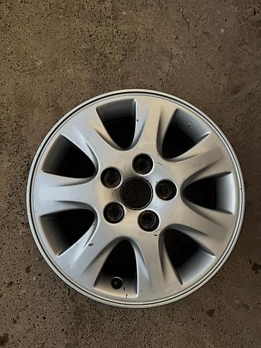 bud e9: Литой алюминиевый диск для легкового автомобиля. - Диаметр — 1