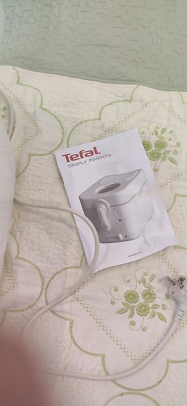 Mətbəx texnikası: Tefal fi̇rmasi̇ni̇ni̇ frutur bi̇si̇rən ci̇hazi̇. İci̇ndə toyuq — 7