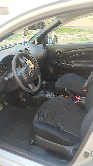 4 göz maşın: Nissan Sunny: 1.2 l | 2014 il Sedan — 4