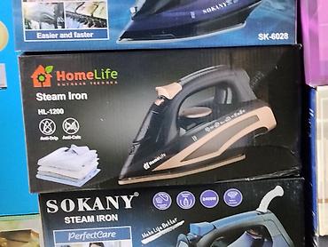 Бытовая техника: Паровой утюг HomeLife HL-1200 - Тип: паровой утюг - Пар: вертикальное — 1