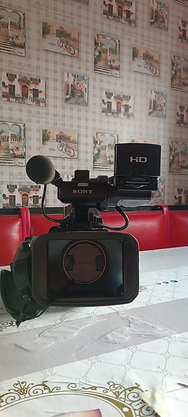 Видеокамеры: Профессиональная видеокамера Sony HXR‑MC1500 - Формат записи: AVCHD — 7